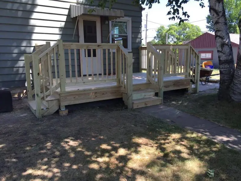 Front porch deck with railings and stairs